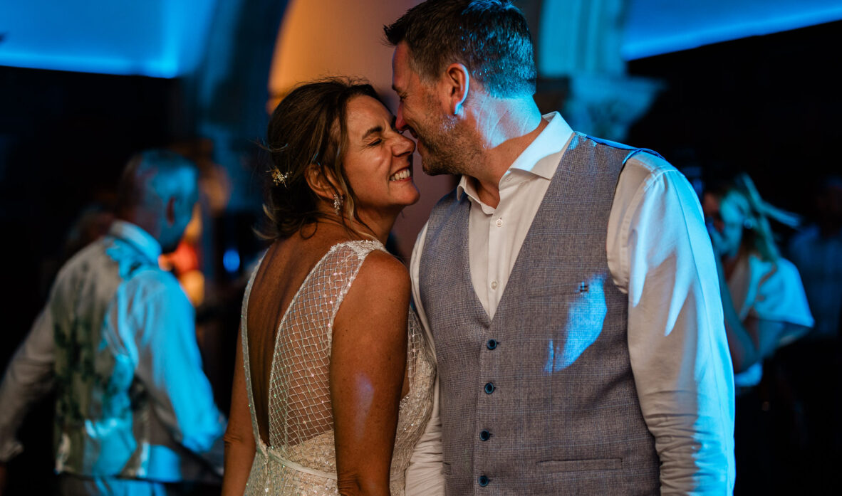 A romantic moment between two newly weds, during the evening dancing.